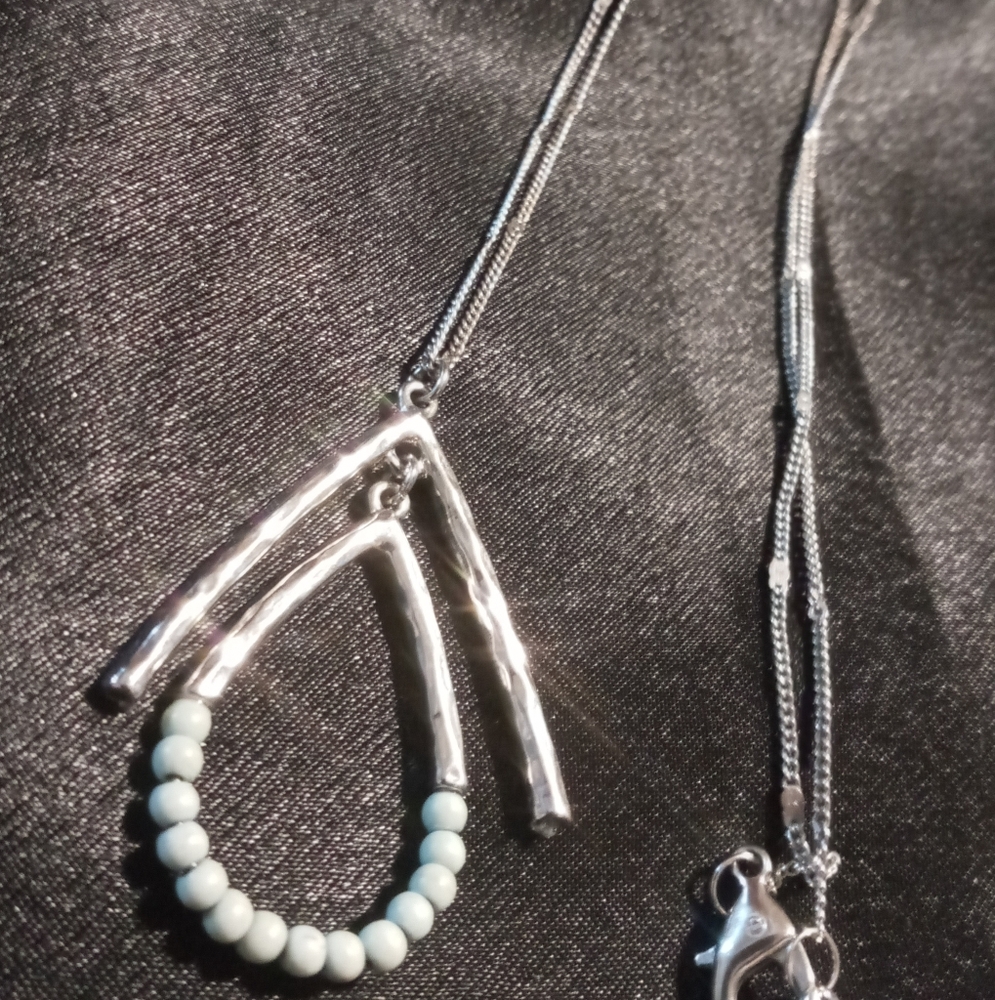 Tear drop long pendant necklace.36 in long. Diamond cut chain
